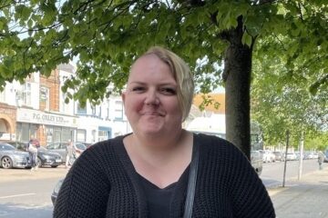 A woman smiling.