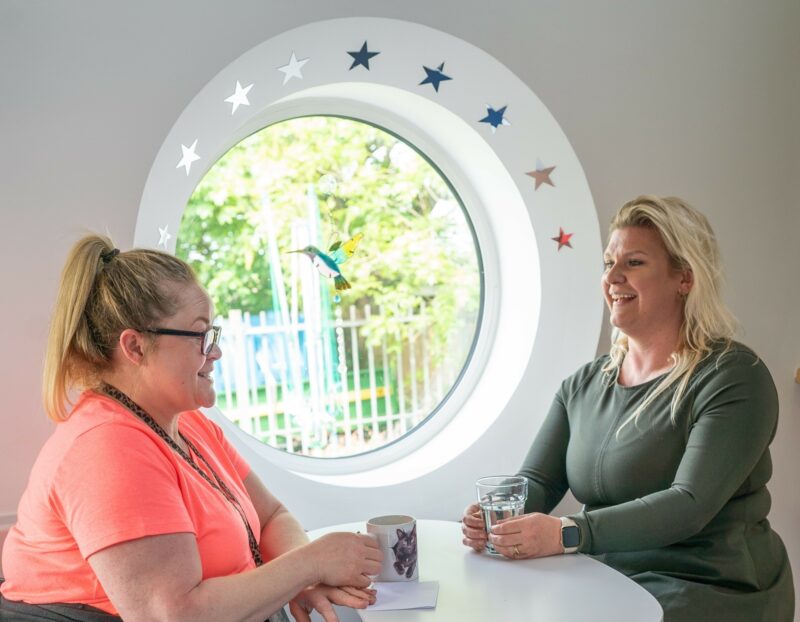 Carer helping person