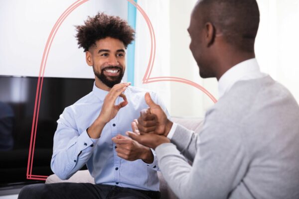 Two men talking.