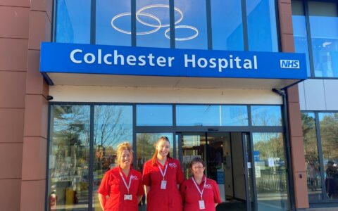 3 Employees  standing outside Colchester Hospital