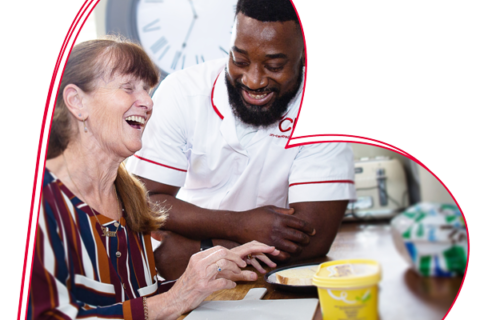 Happy man supporting an older women at home